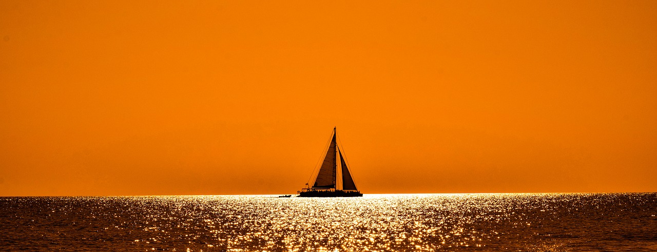 Image - sunset sunlight boat catamaran