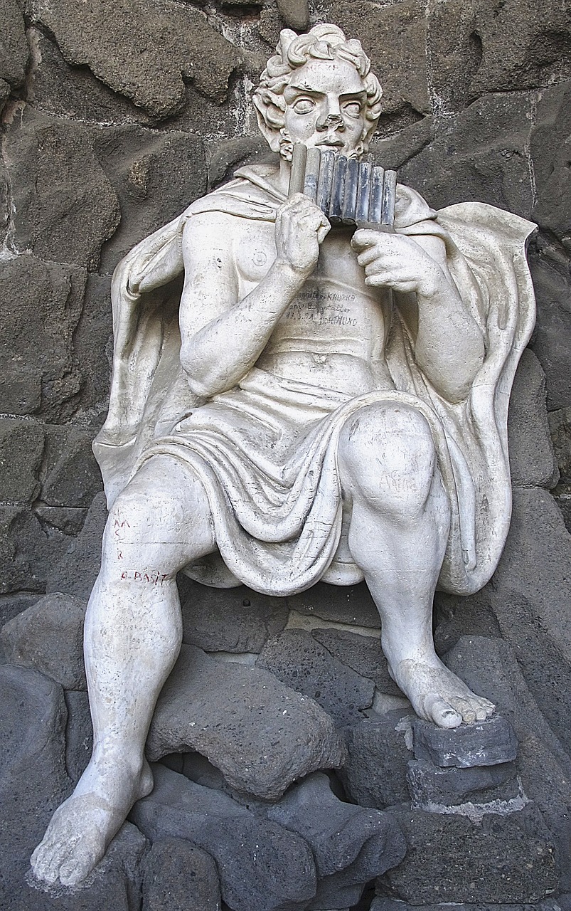 Image - statue pan pan flute grotto figure