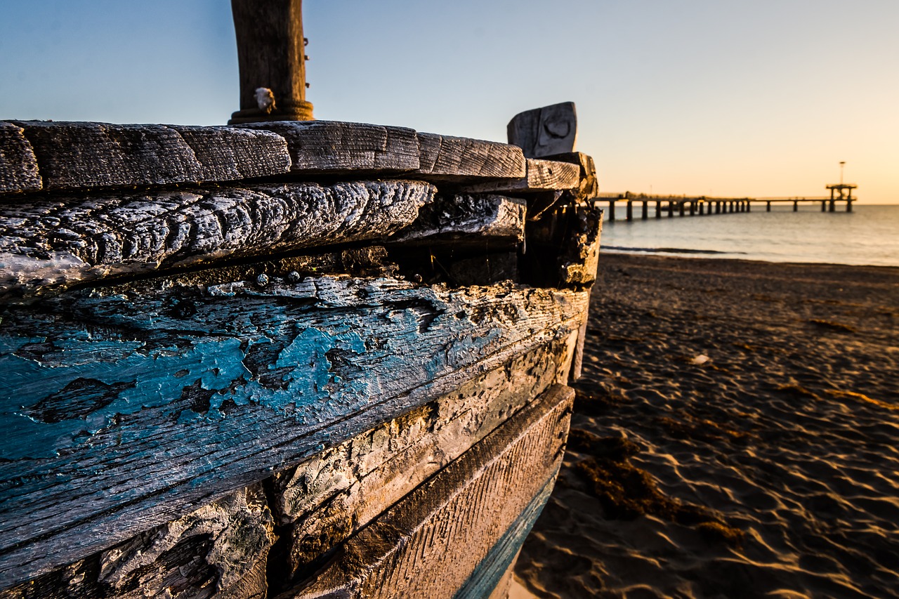 Image - old wooden boat at sunrise