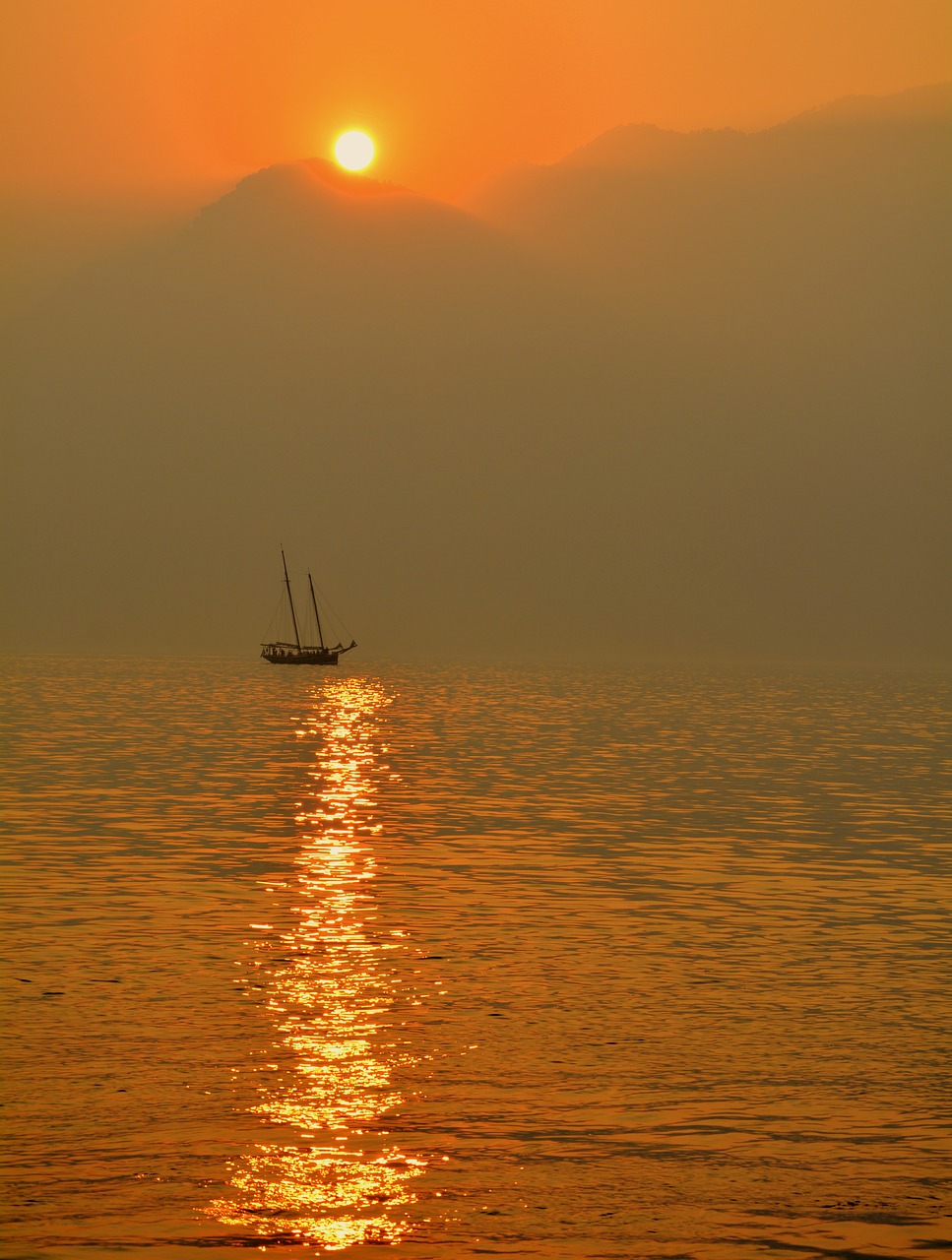 Image - sailing ship lake sunset sun