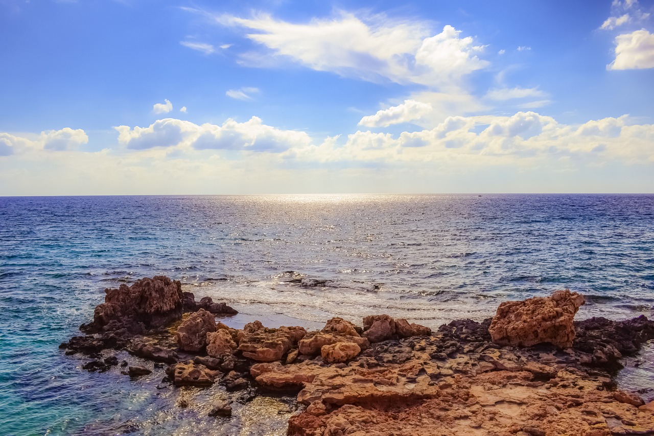 Image - rocky coast sea sky clouds horizon