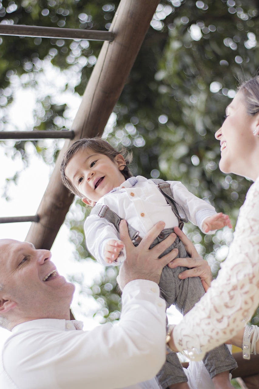 Image - family playing child smiles couple