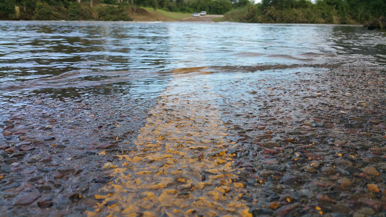 Image - road yellow line flooded water