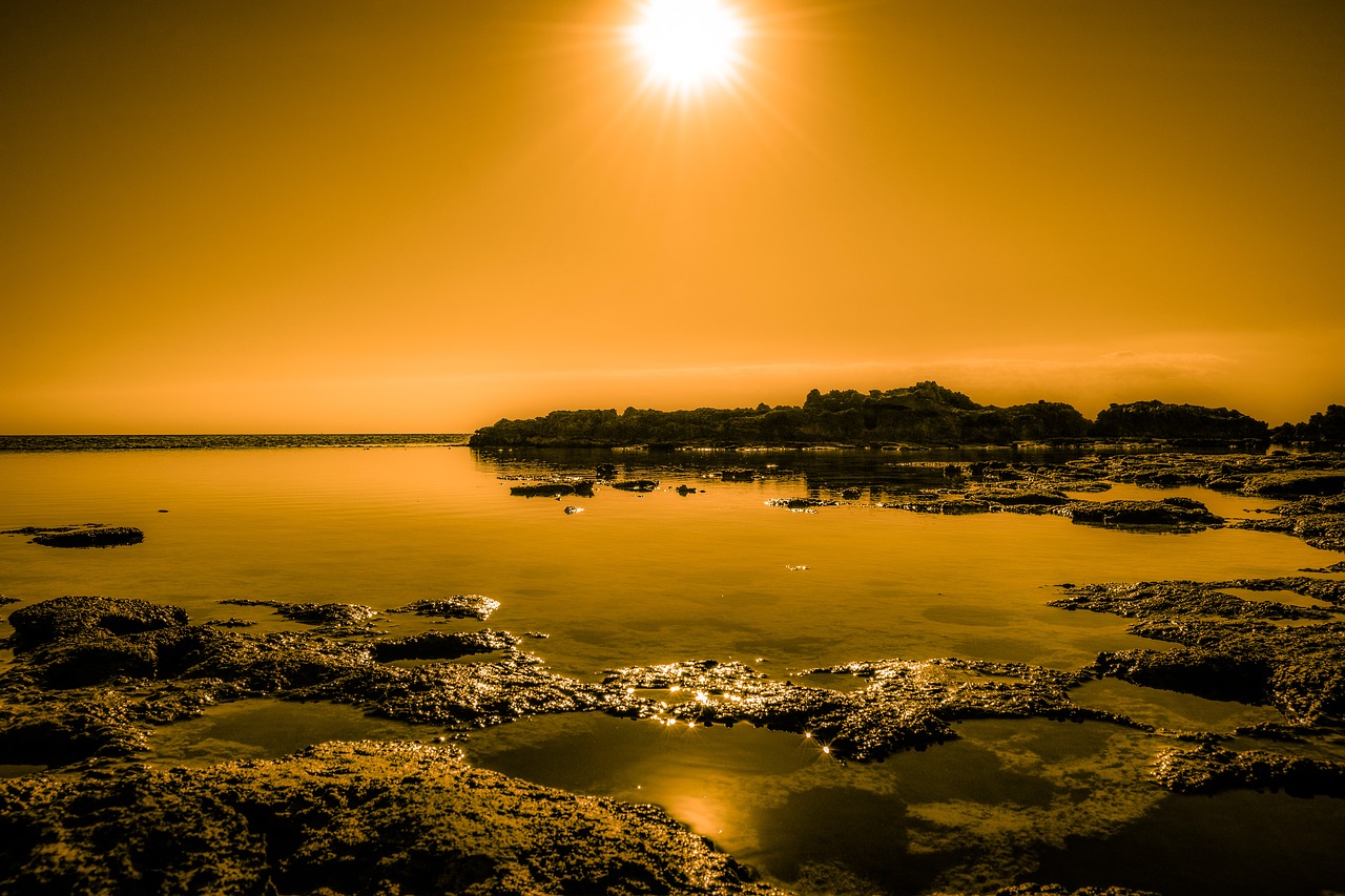 Image - sunset sun rocky coast sea lagoon