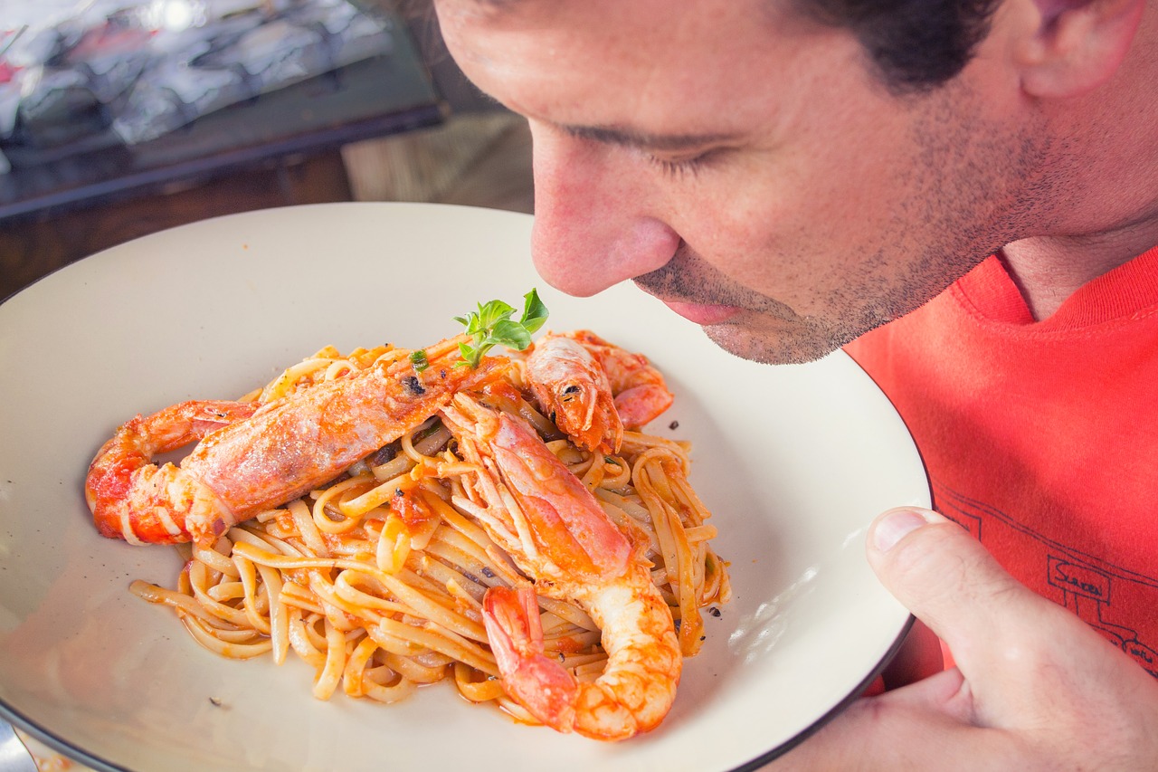 Image - man savoury pasta smelling food