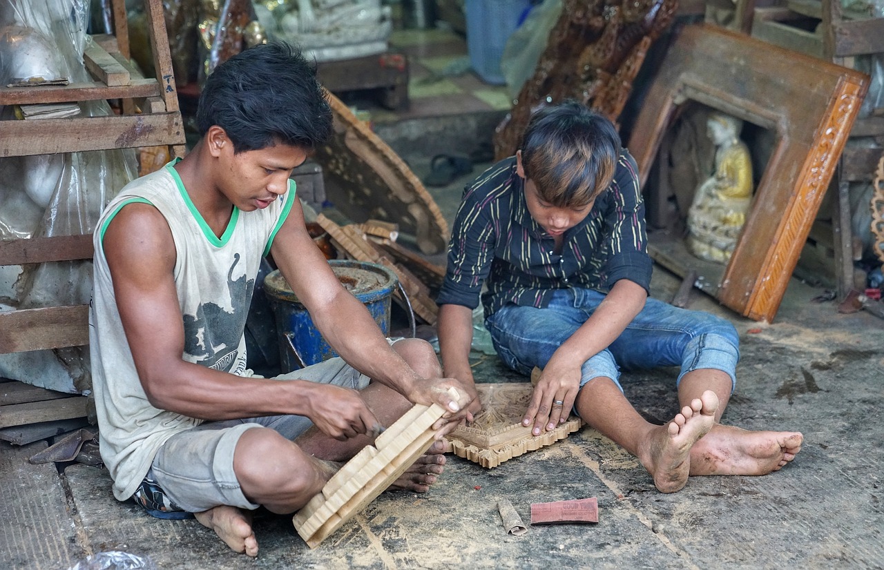 Image - boys wood carving temple souvenirs