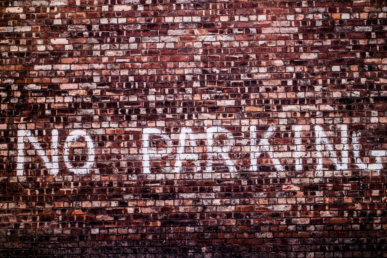 Image - brick wall no parking painted wall