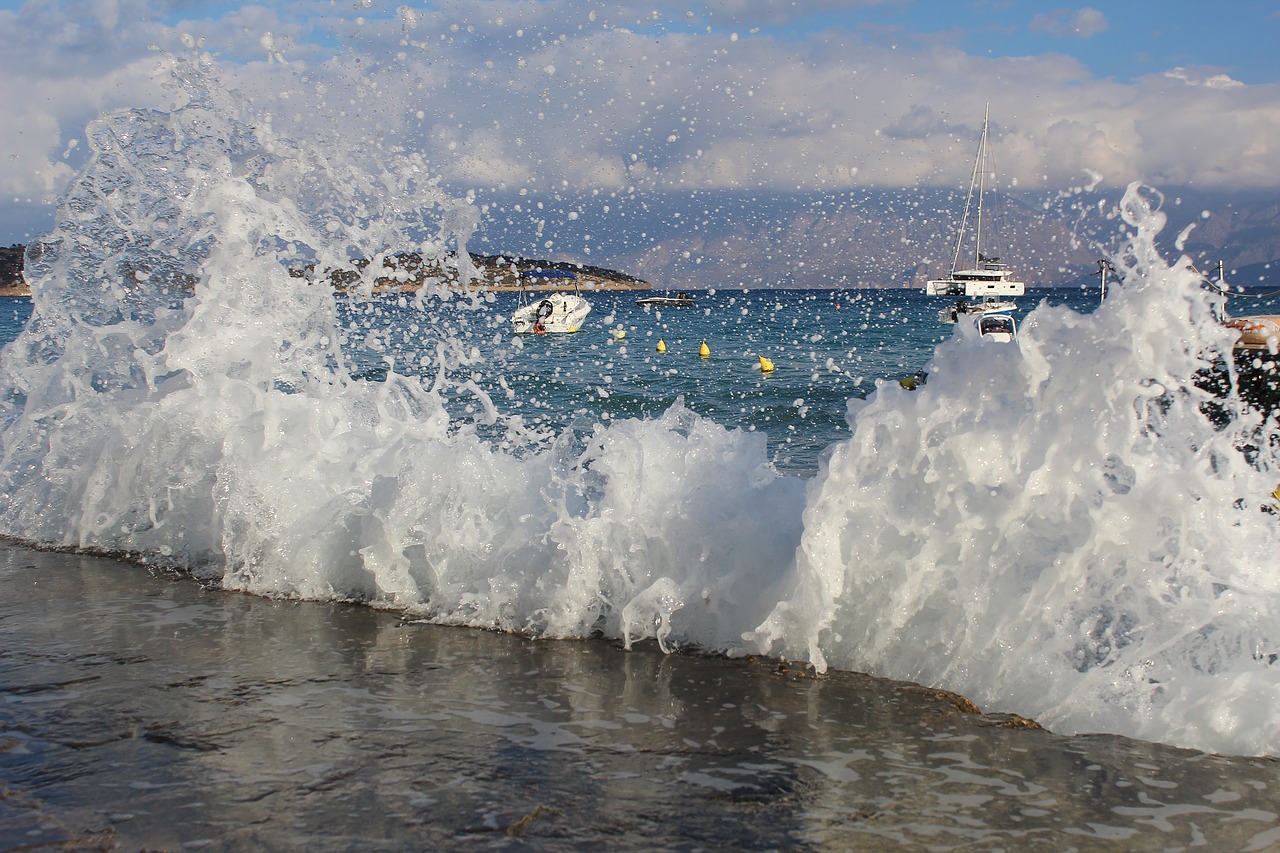 Image - sea wave surf spray sky sun