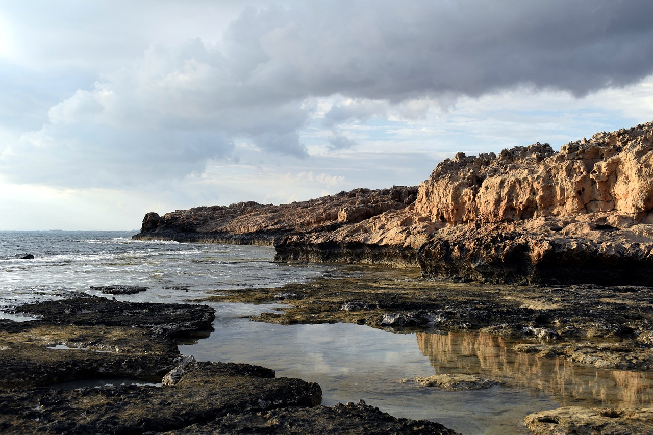 Image - rocky coast sea sky clouds