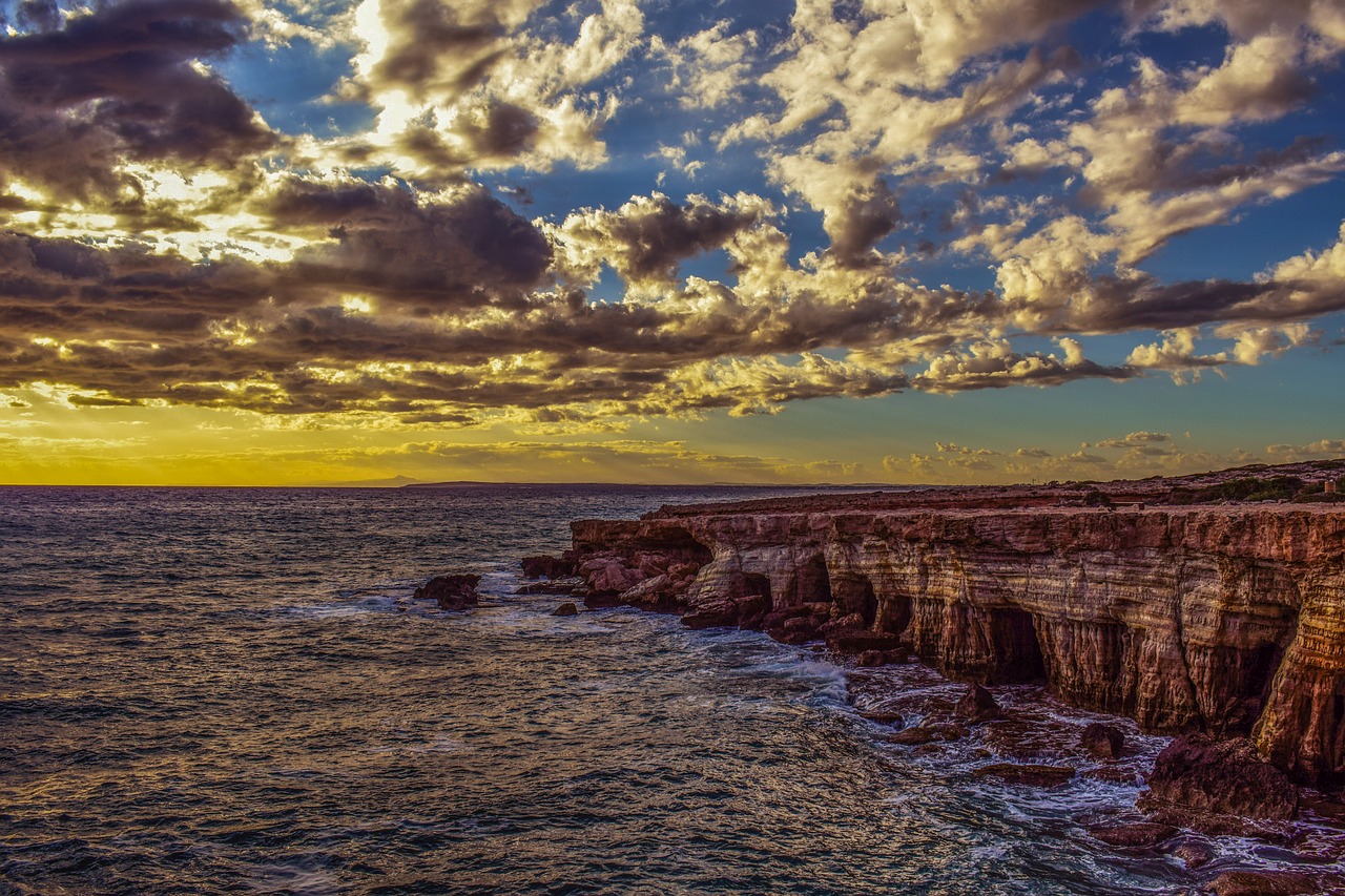 Image - sea caves coast sea sky clouds