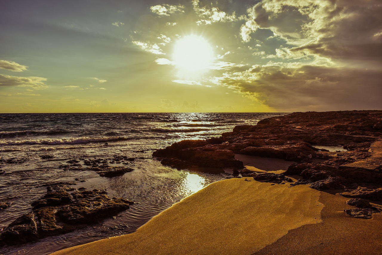 Image - beach coast sunset rock sand sun