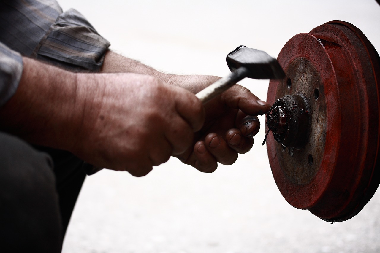 Image - car repairman hands scrap old