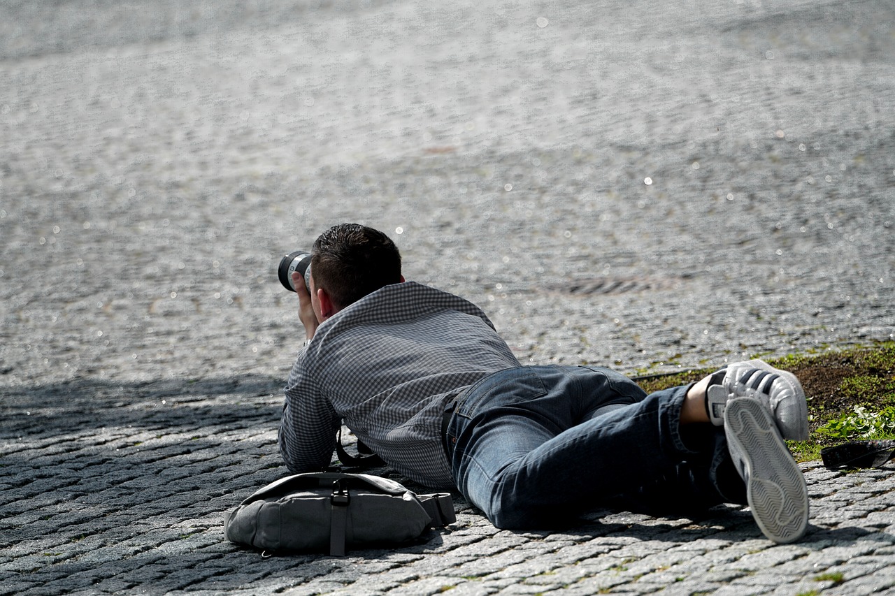 Image - photographer in action action out