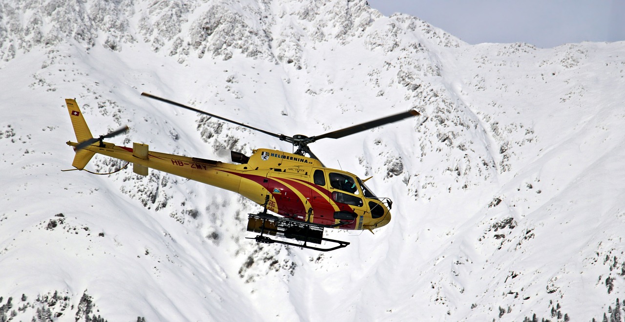 Image - helicopter mountains snow