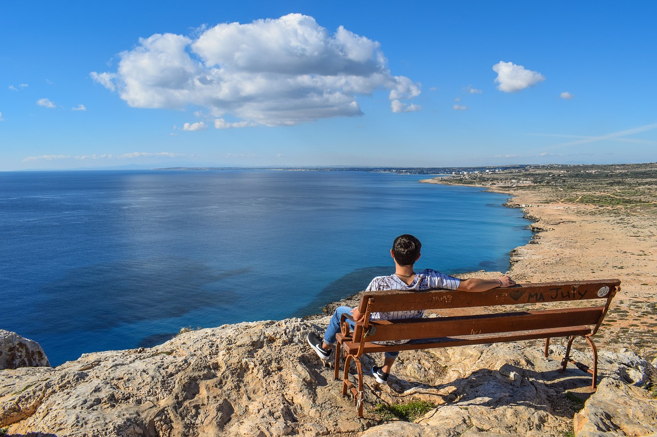 Image - gazing at sea boy bench sea