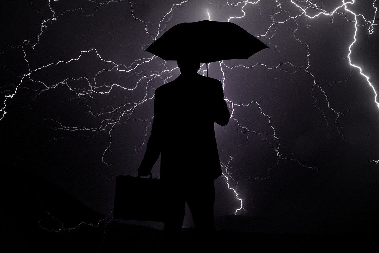 Image - businessman crisis rain flash