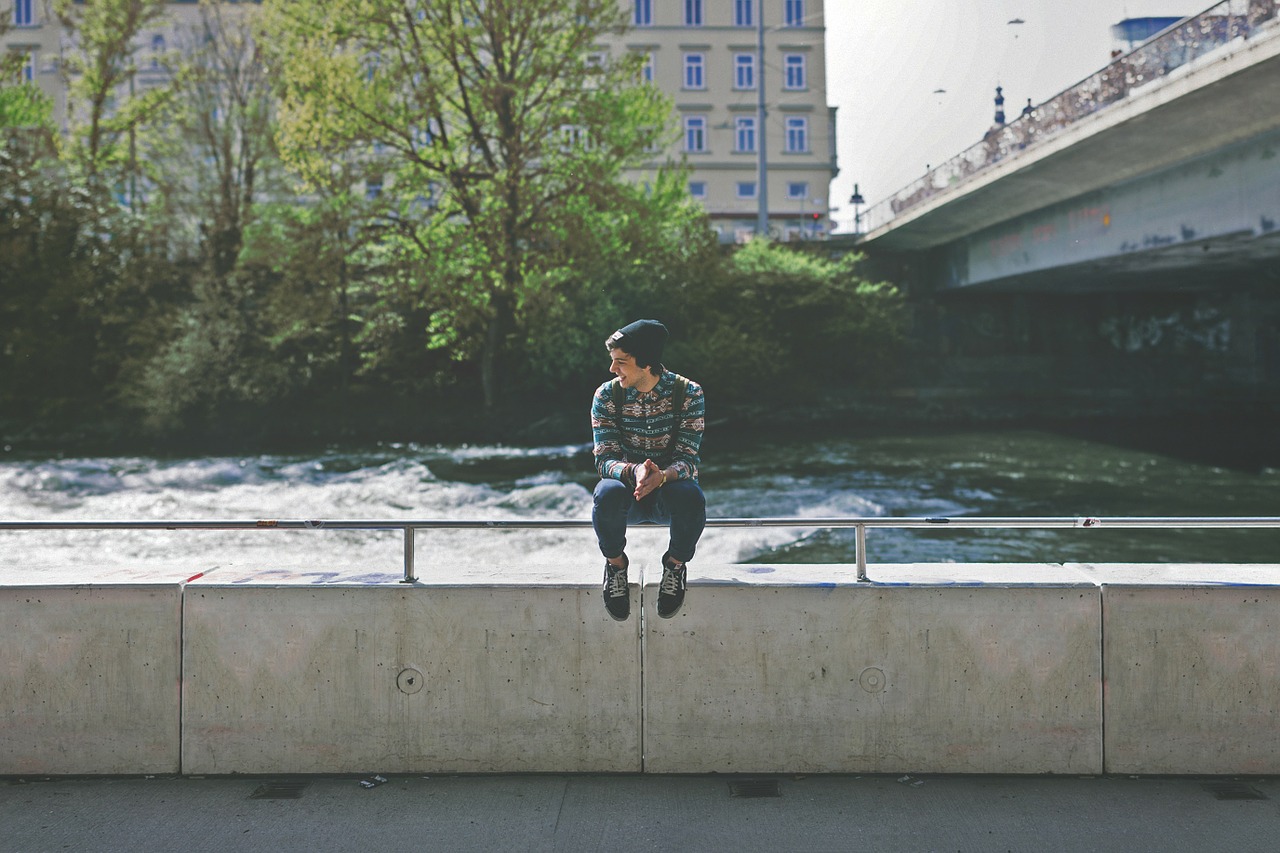 Image - urban wall sitting boy man