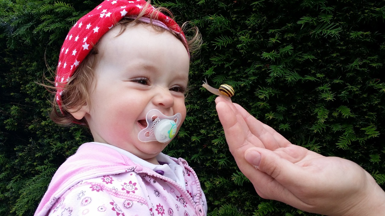 Image - baby small child laugh joy snail