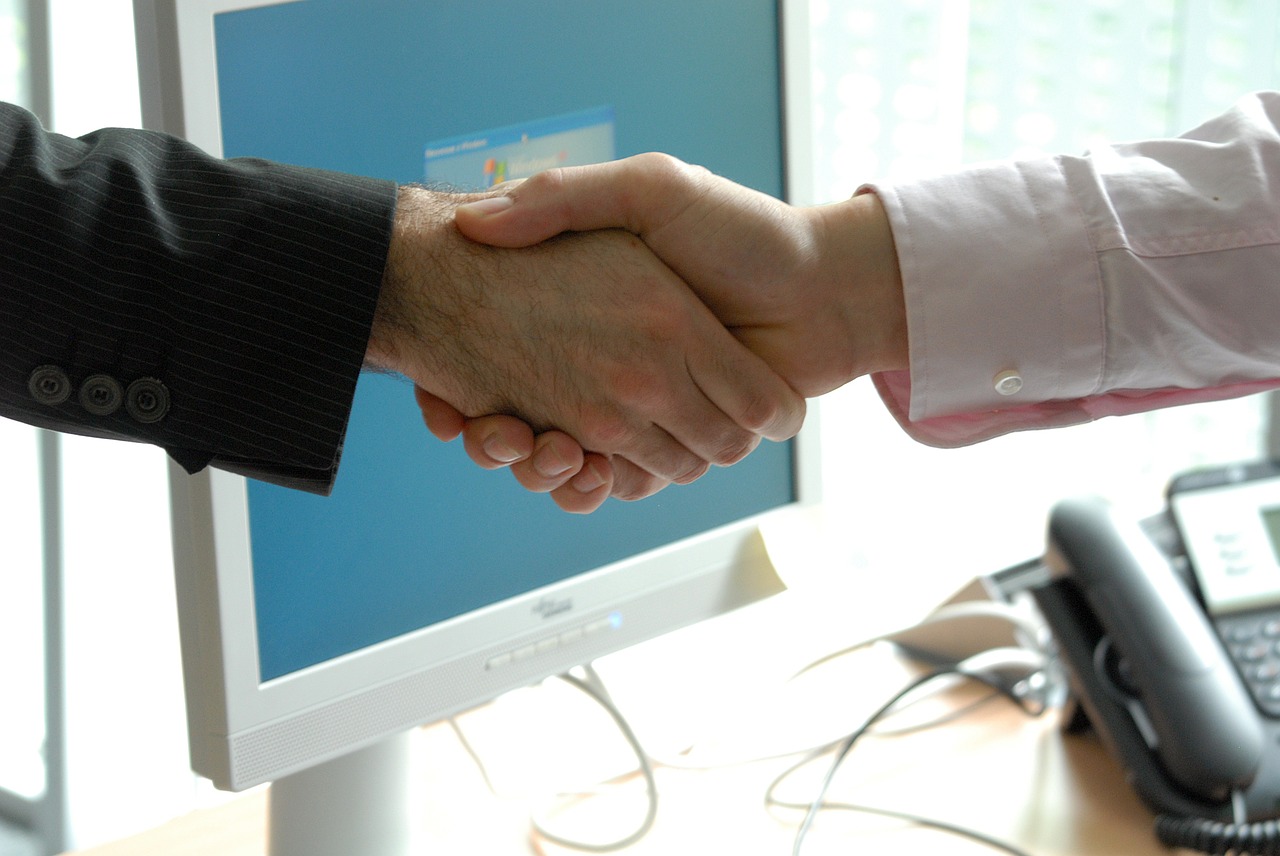 Image - handshake business professional