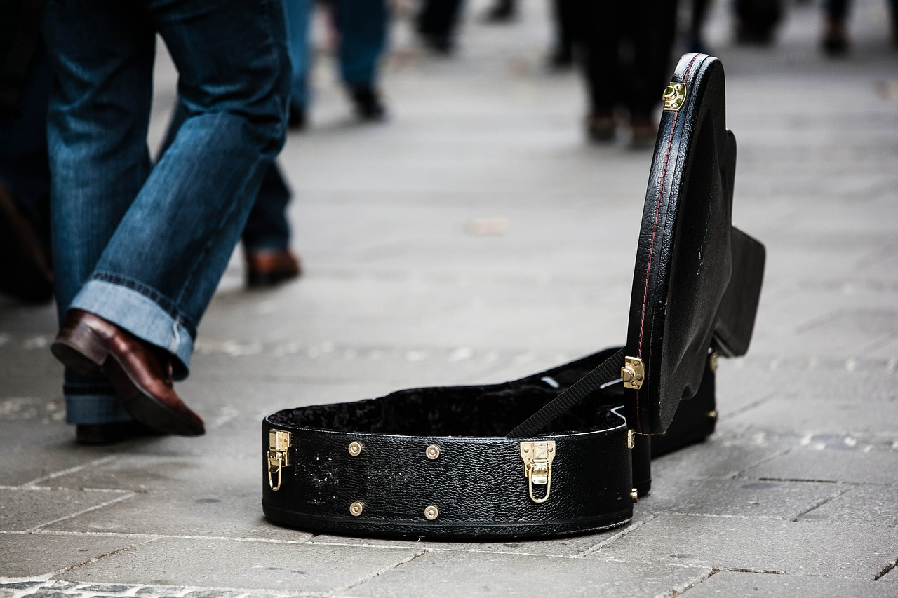 Image - guitar case street musicians donate