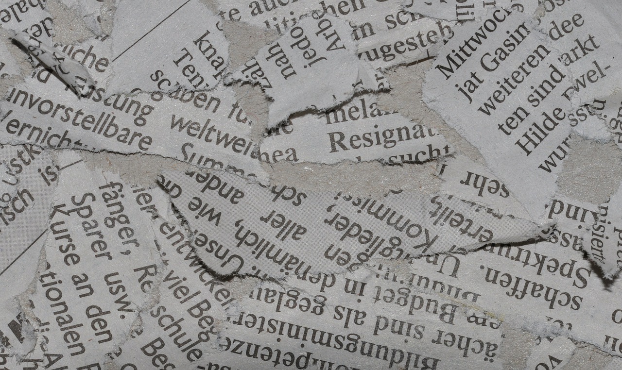 Image - newspaper waste paper torn glued