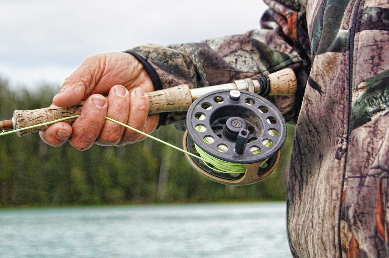 Image - fisherman fishing reel river rod