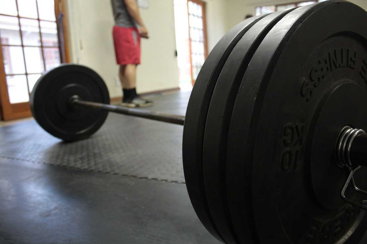 Image - gym barbell training exercise