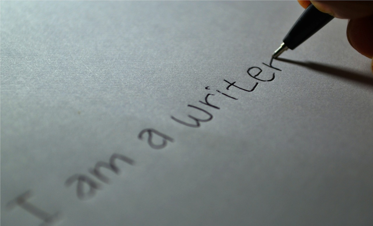 Image - writer writing paper letter author