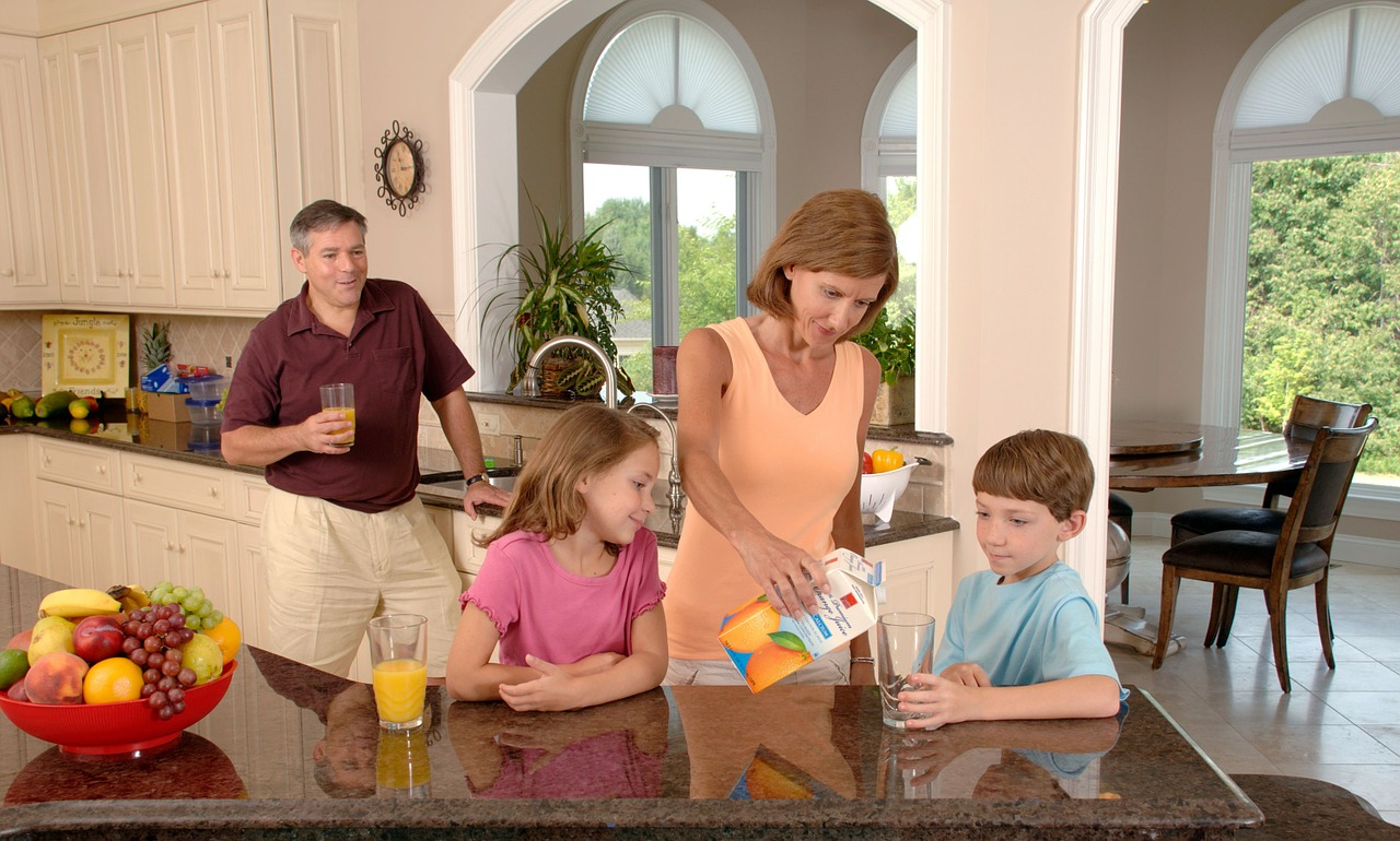 Image - family drinking orange juice glass