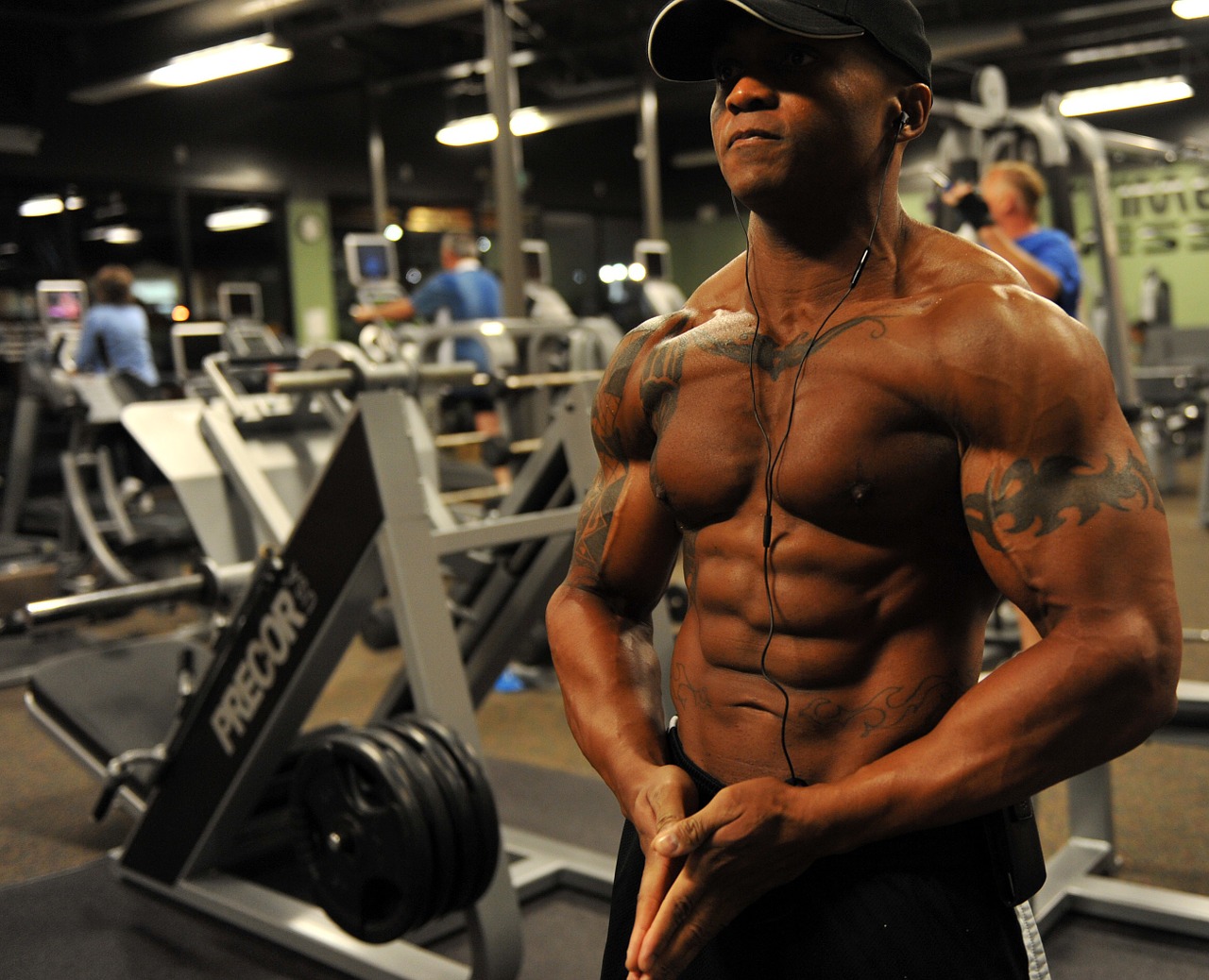 Image - bodybuilder weight training stress