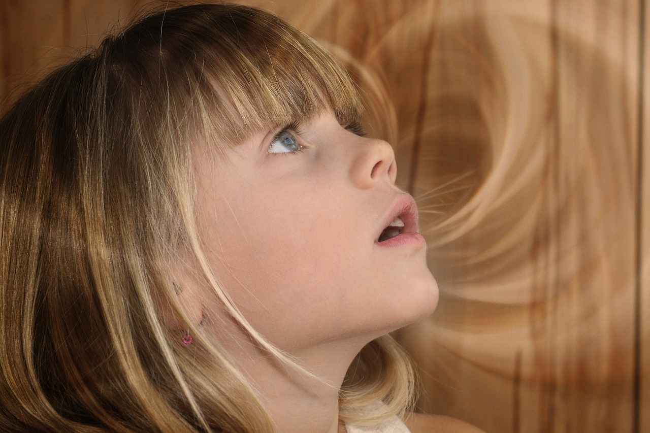 Image - child girl blond face view amazed