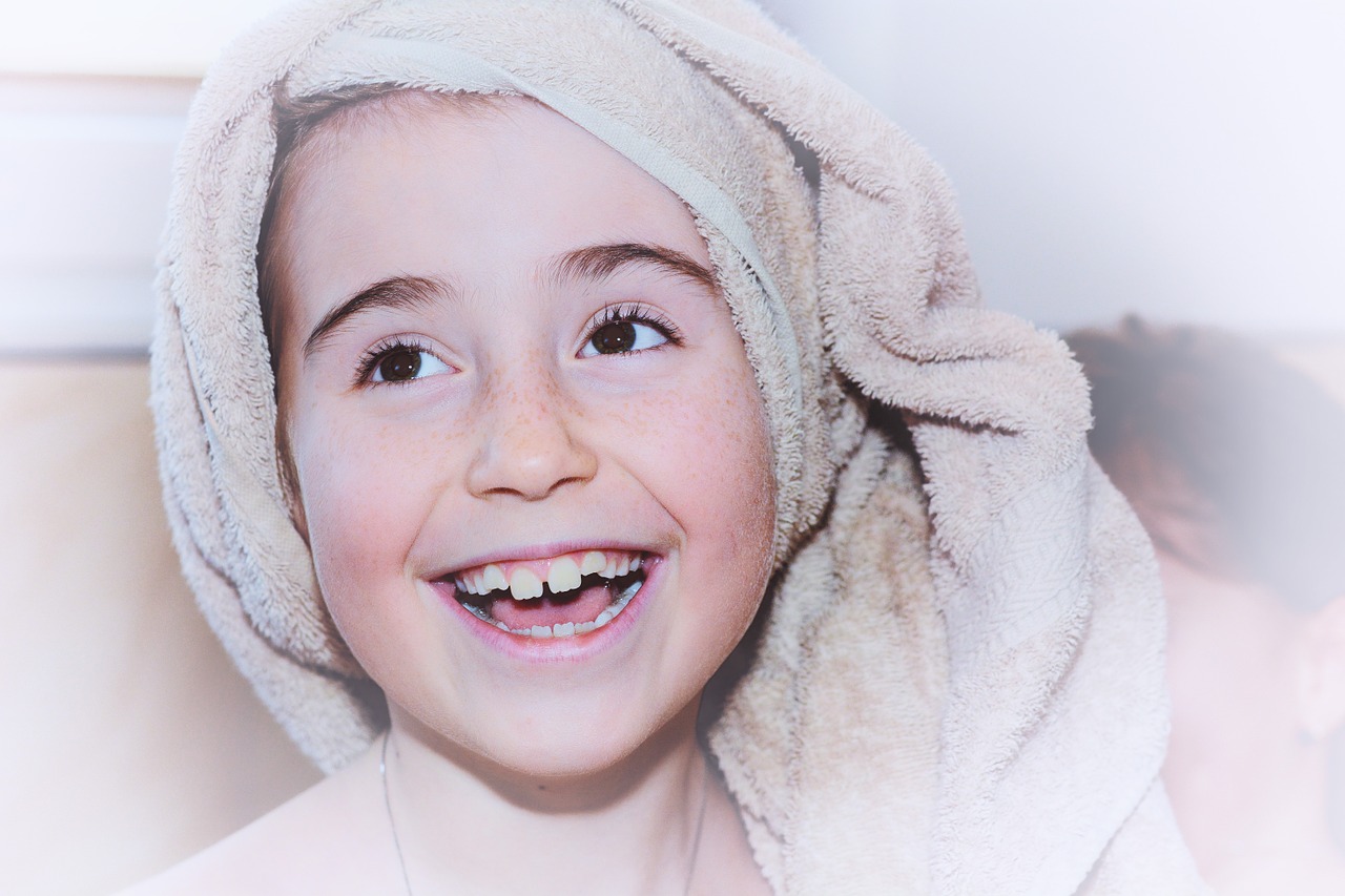 Image - child girl face towel laugh