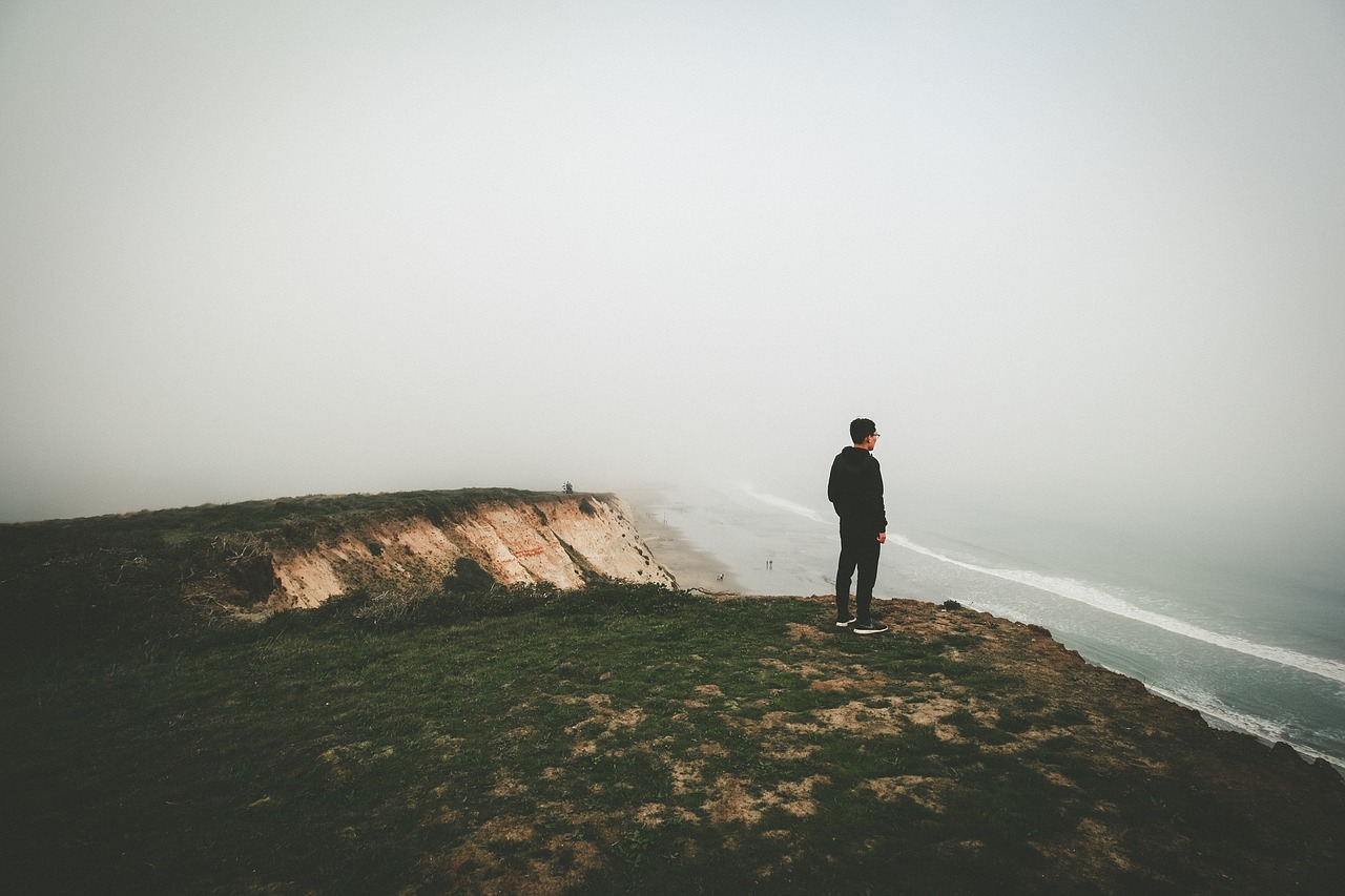 Image - person standing looking view ocean