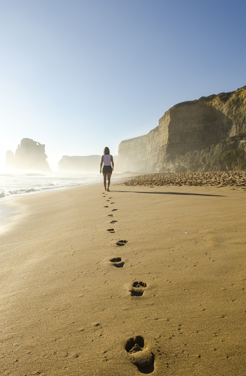 Image - beach footsteps sand walking woman