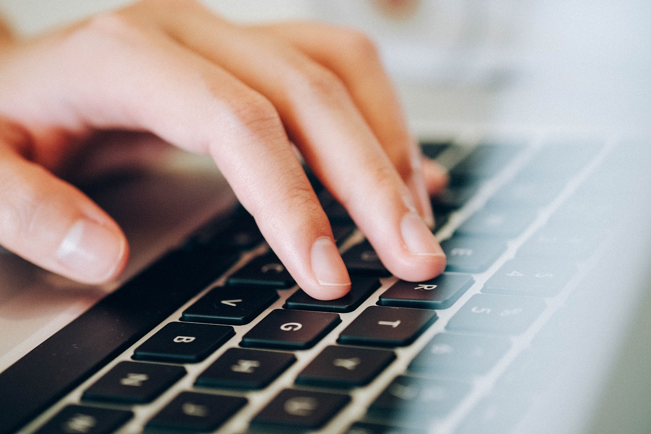 Image - laptop human hands keyboard typing