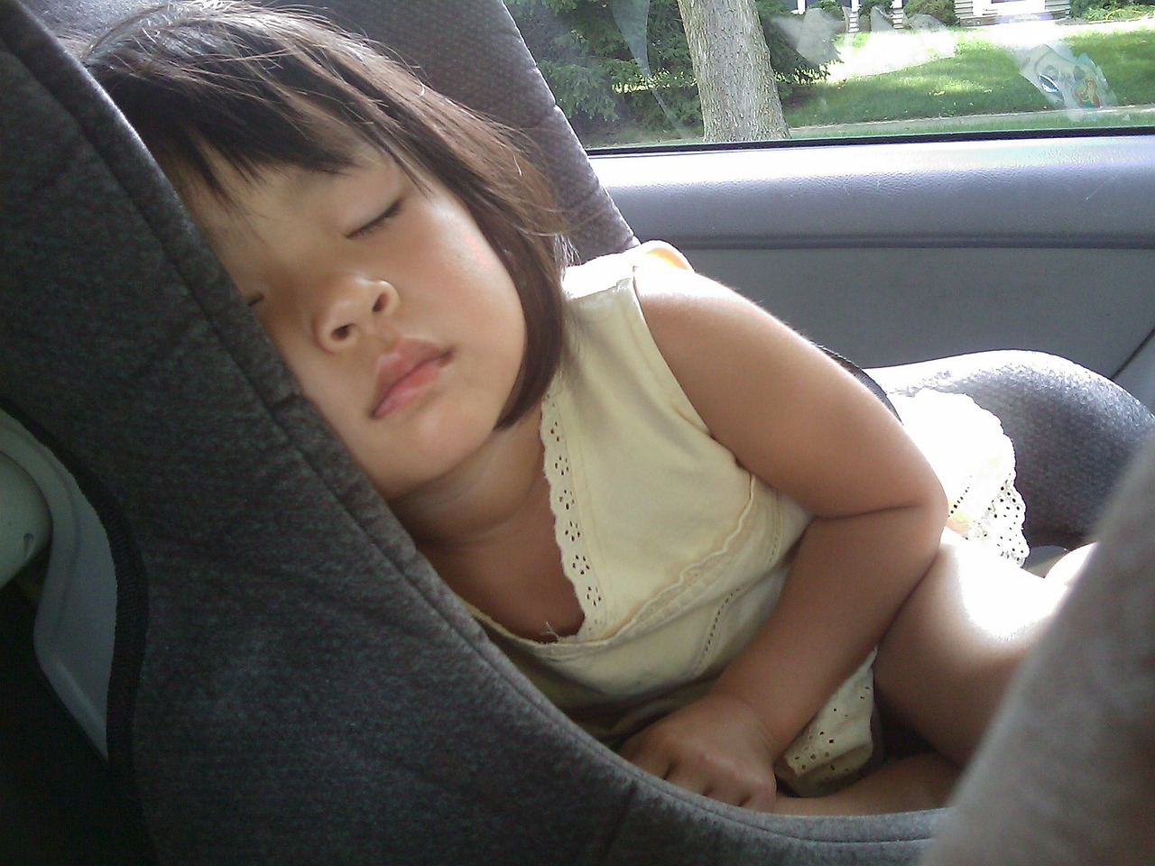 Image - child sleeping car seat girl baby