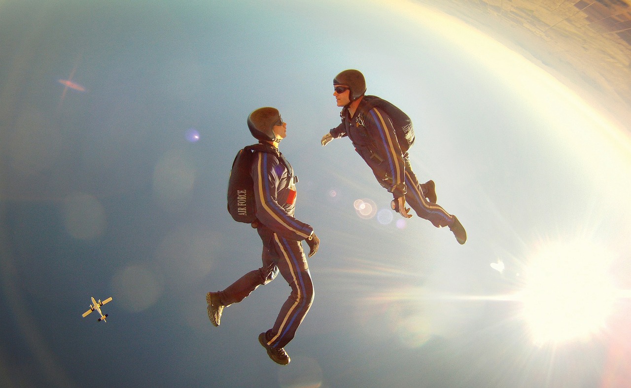 Image - free fall diving sky clouds divers