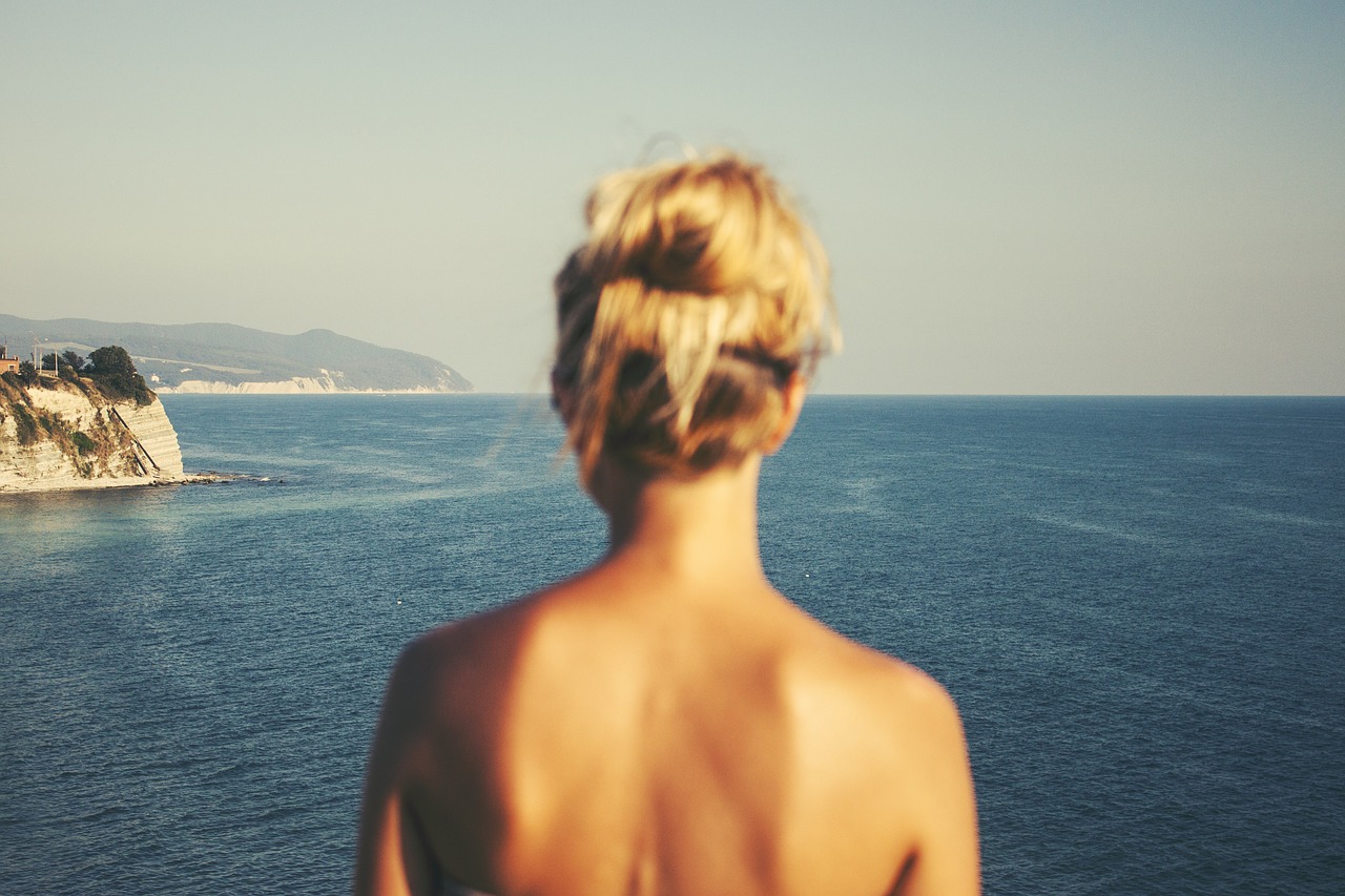 Image - woman back blonde looking water