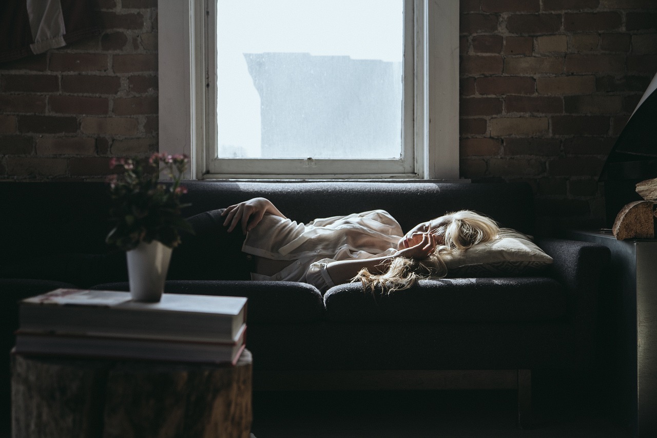 Image - woman sleeping sofa home relaxing