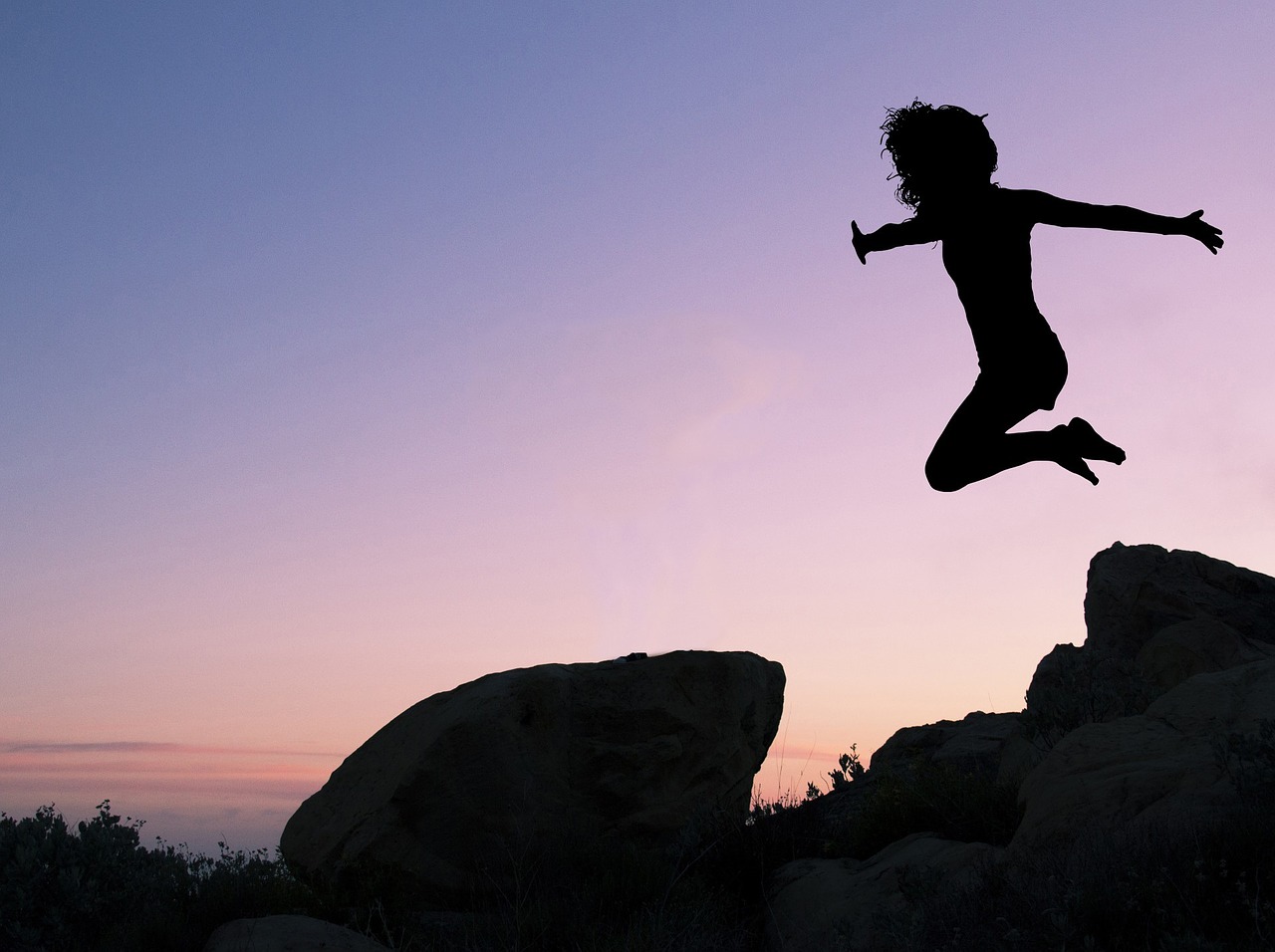 Image - girl leaping rock