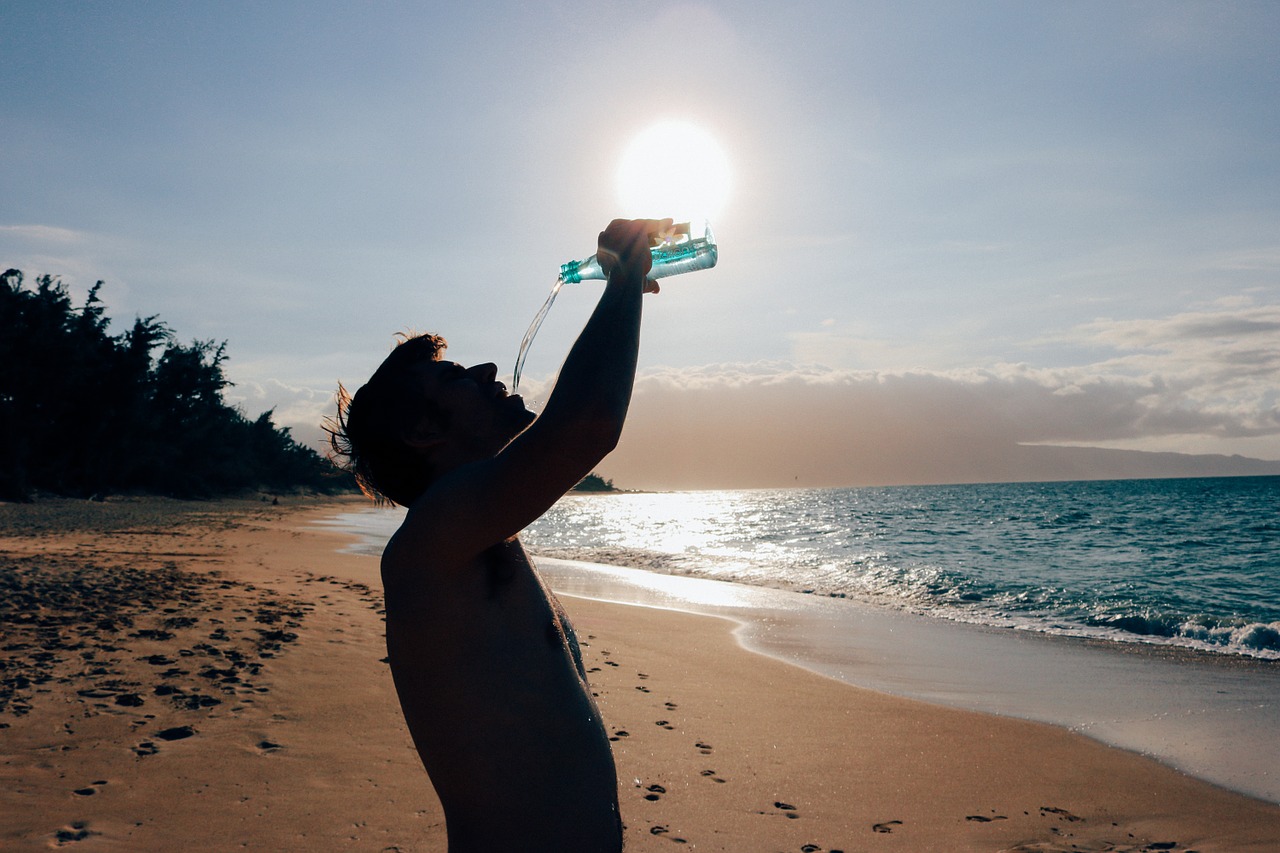 Image - man male drinking water beach