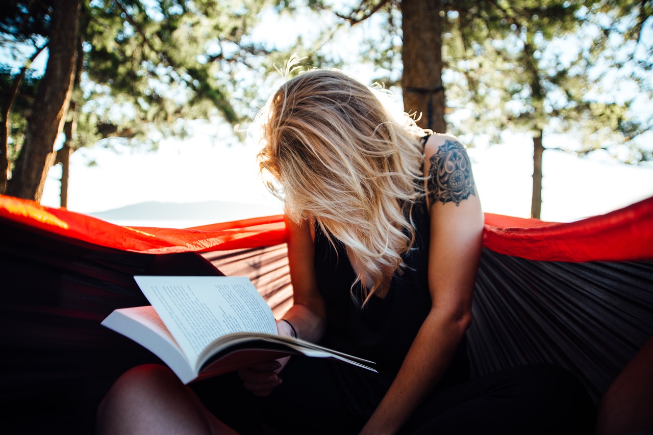 Image - woman reading book read hammock