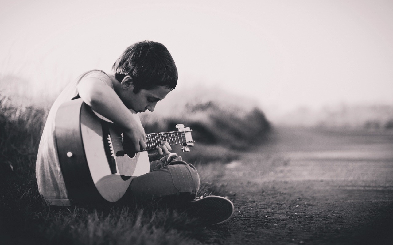 Image - boy guitar sitting outdoors