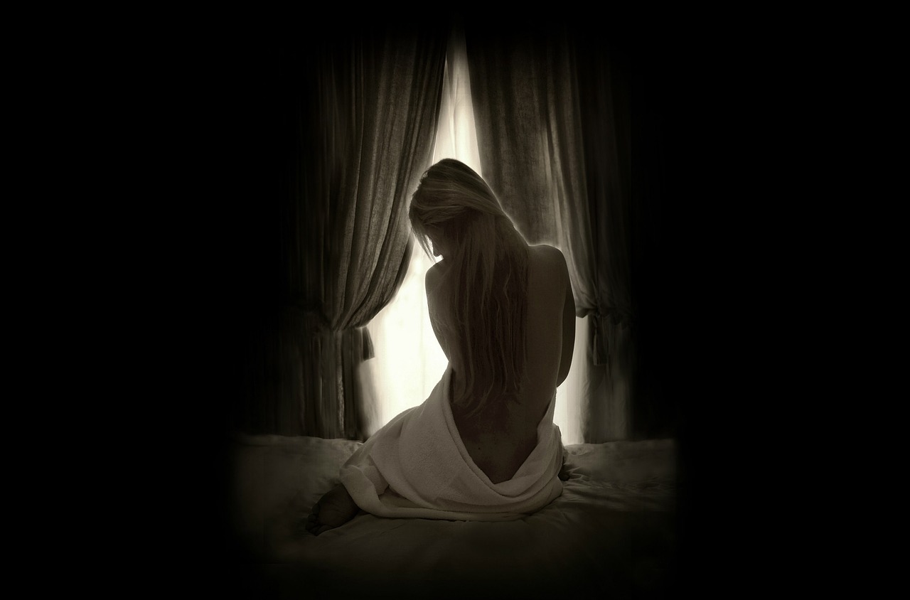 Image - woman sitting window silhouette